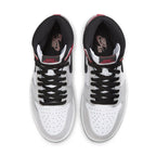 Top view of Air Jordan 1 Retro High Light Smoke Grey sneakers with black and red accents.