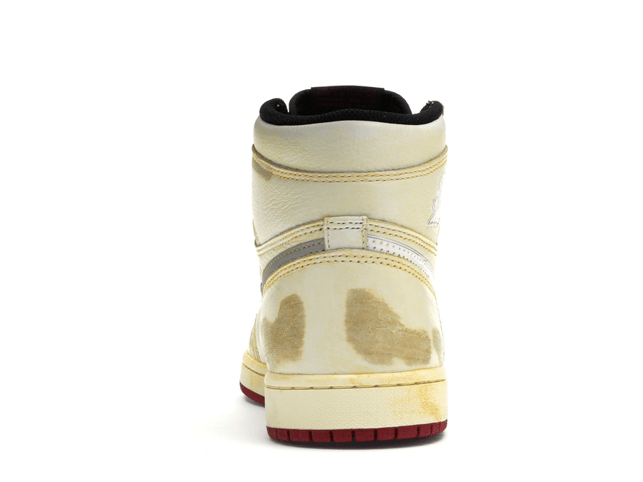 Back view of the Nigel Sylvester x Air Jordan 1 Retro High, showcasing distressed cream leather and signature details.