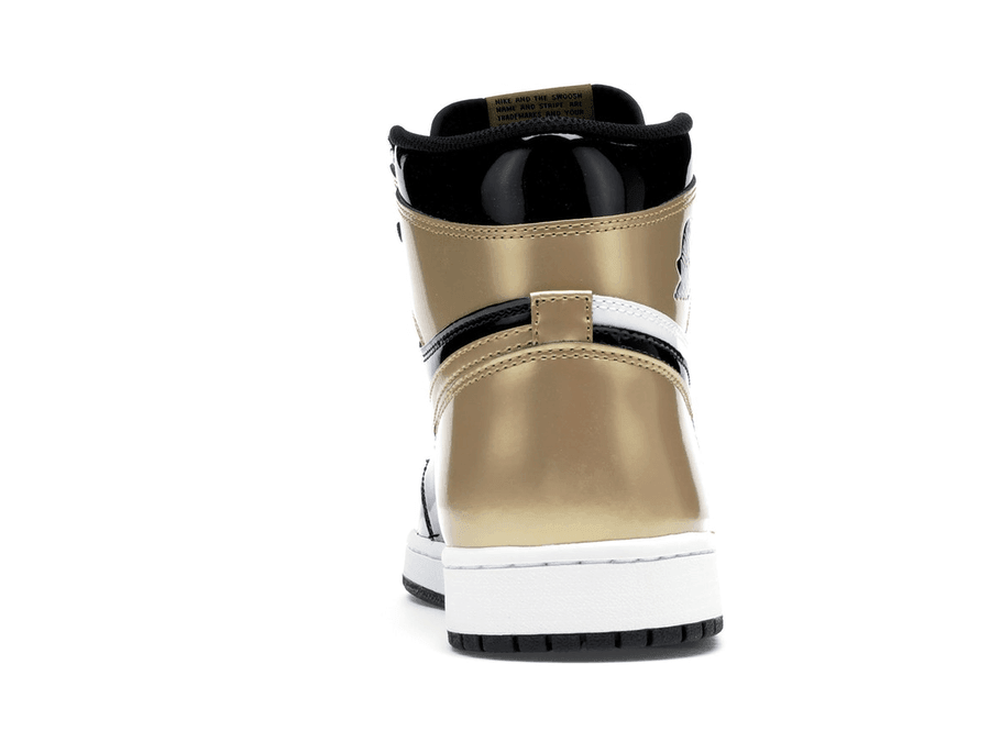 Back view of Jordan 1 Retro High NRG Patent Gold Toe with shiny gold, black, and white color blocking.