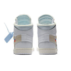 Back view of Off-White x Jordan 1 Retro High White sneakers showcasing premium materials and deconstructed design.