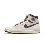 Jordan 1 Retro High OG A Ma Maniére sneakers in beige and maroon, showcasing high-end design and heritage.