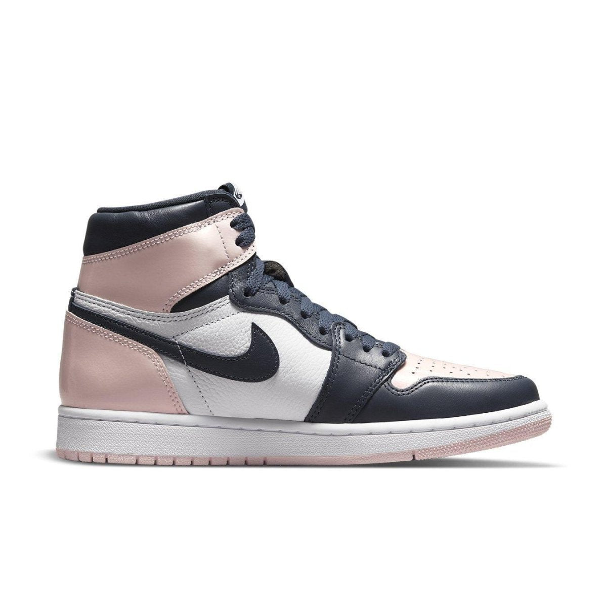Jordan 1 Retro High OG Atmosphere (W) in pink, navy, and white, showcasing a stylish design inspired by Michael Jordan.
