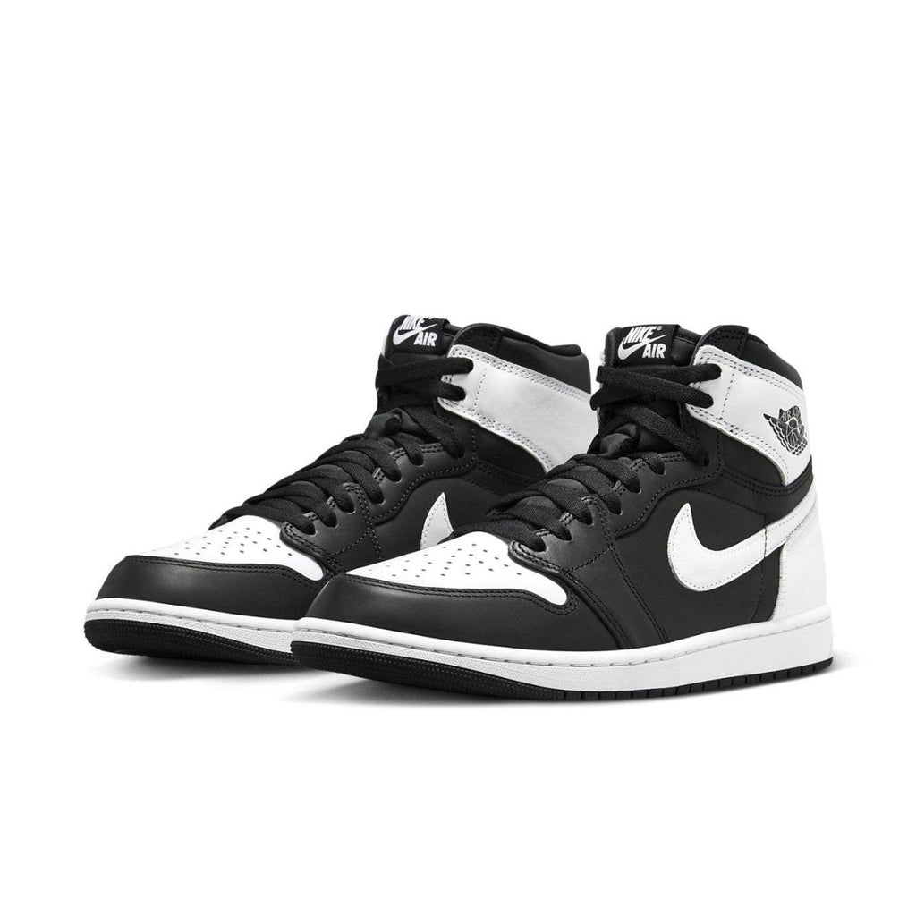 Air Jordan 1 Retro High OG 'Black White 2.0' sneakers featuring black and white leather design.