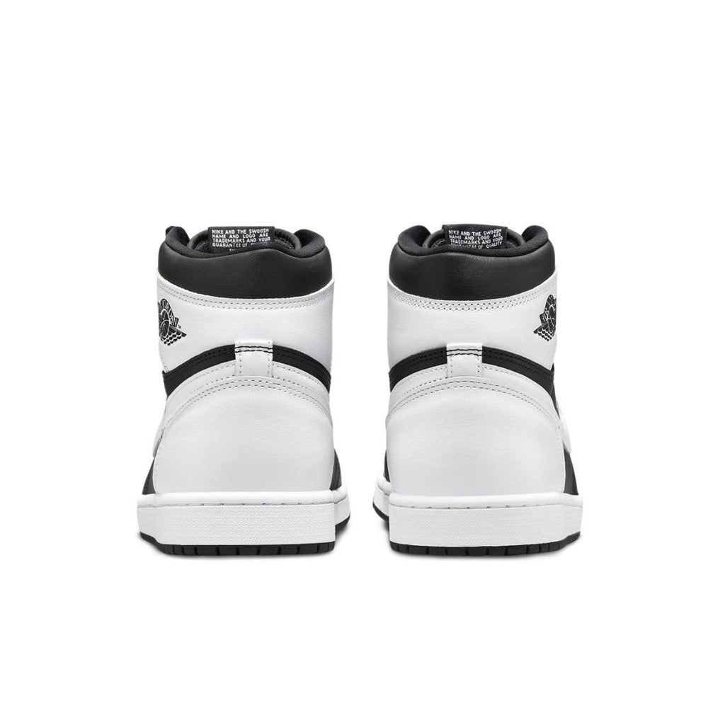 Air Jordan 1 Retro High OG Black White 2.0 sneakers back view showcasing stylish black and white design.