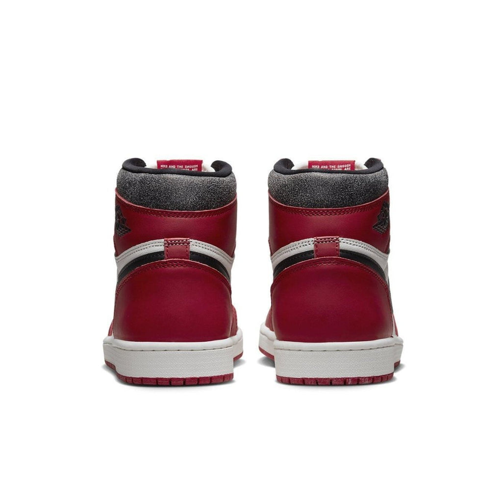 Back view of Air Jordan 1 Retro High OG Chicago Lost and Found in red and white with black accents.
