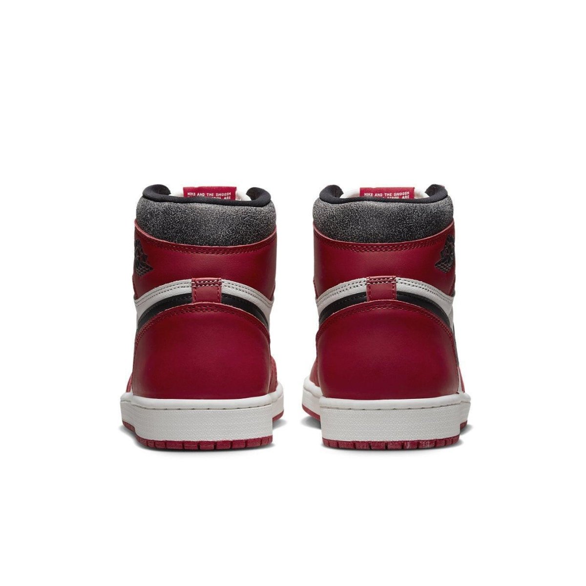 Back view of Air Jordan 1 Retro High OG Chicago Lost and Found in red and white with black accents.