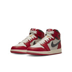Air Jordan 1 Retro High OG Chicago Lost and Found GS sneakers with red and white leather design.