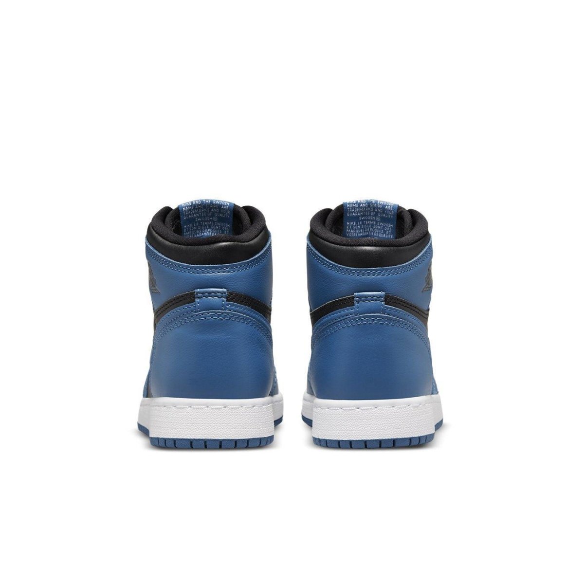 Rear view of Jordan 1 Retro High OG Dark Marina Blue GS sneakers showcasing blue leather and white sole.