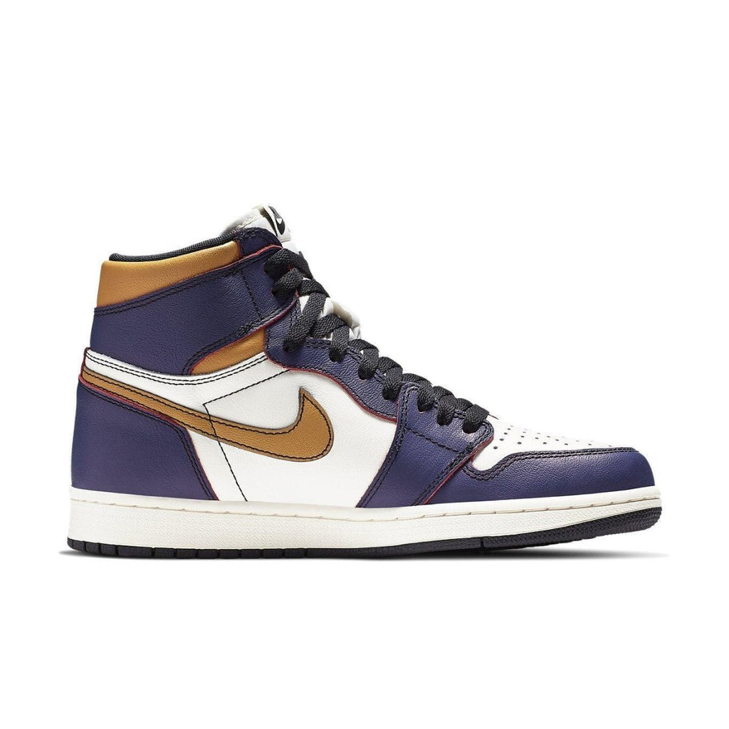Nike Air Jordan 1 Retro High OG Defiant SB LA to Chicago sneaker in navy and white.