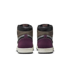 Back view of Air Jordan 1 Retro High OG Hand Crafted, showcasing purple and brown leather uppers.