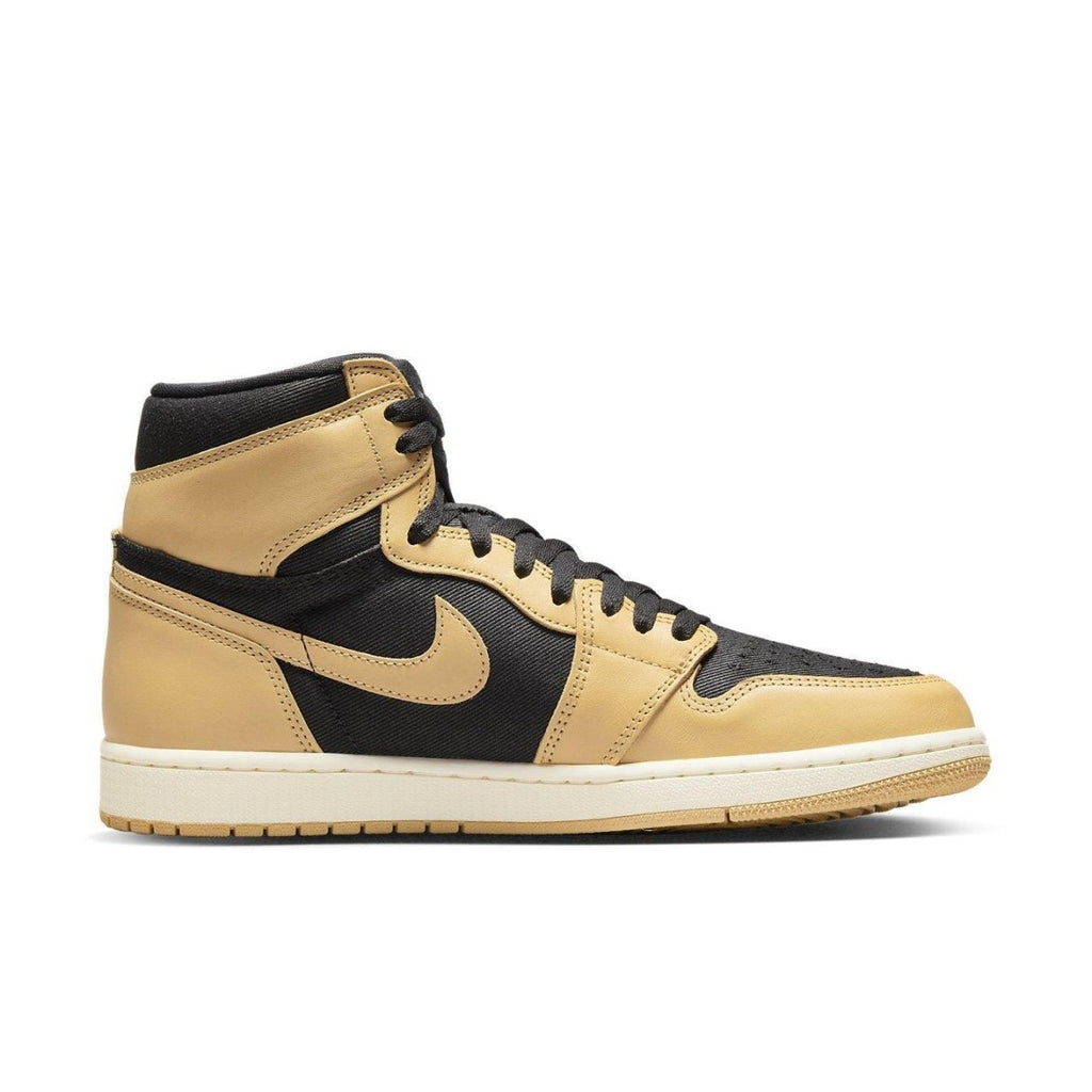 Jordan 1 Retro High OG Heirloom featuring black twill and Vachetta Tan leather design.