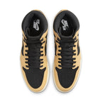 Top view of Jordan 1 Retro High OG Heirloom sneakers with black and Vachetta Tan design and Nike Air branding.