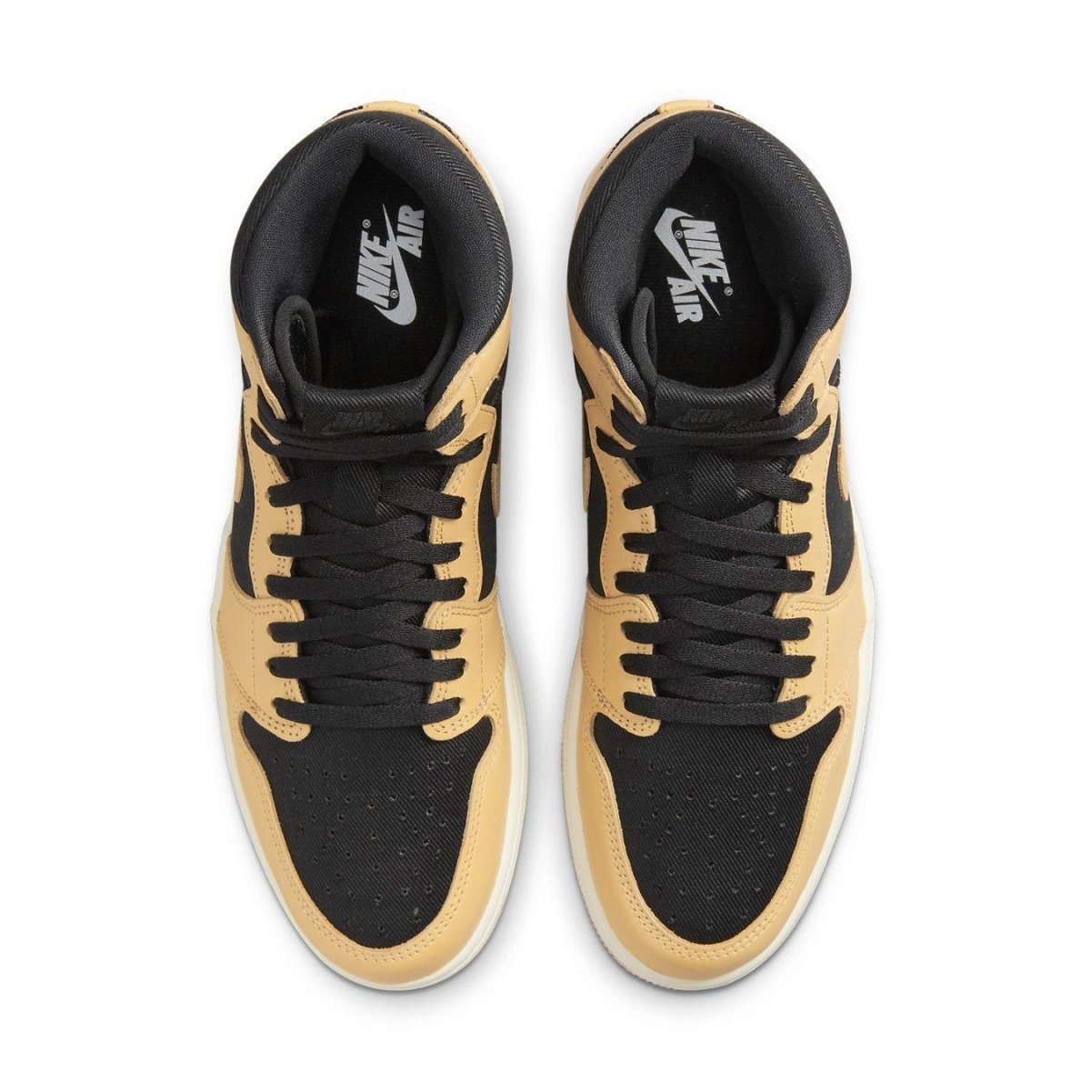 Top view of Jordan 1 Retro High OG Heirloom sneakers with black and Vachetta Tan design and Nike Air branding.