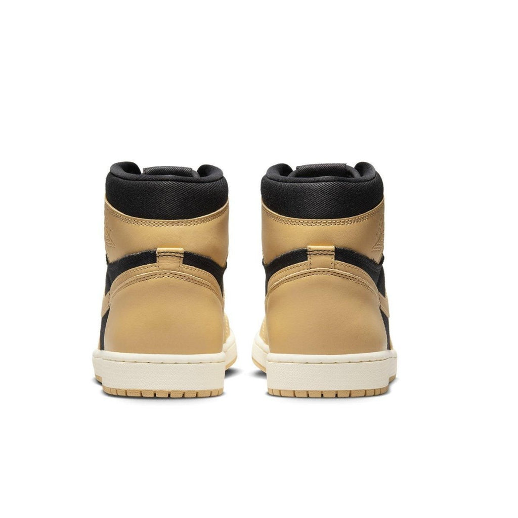 Rear view of Air Jordan 1 Retro High OG Heirloom showcasing black and Vachetta Tan colorway.