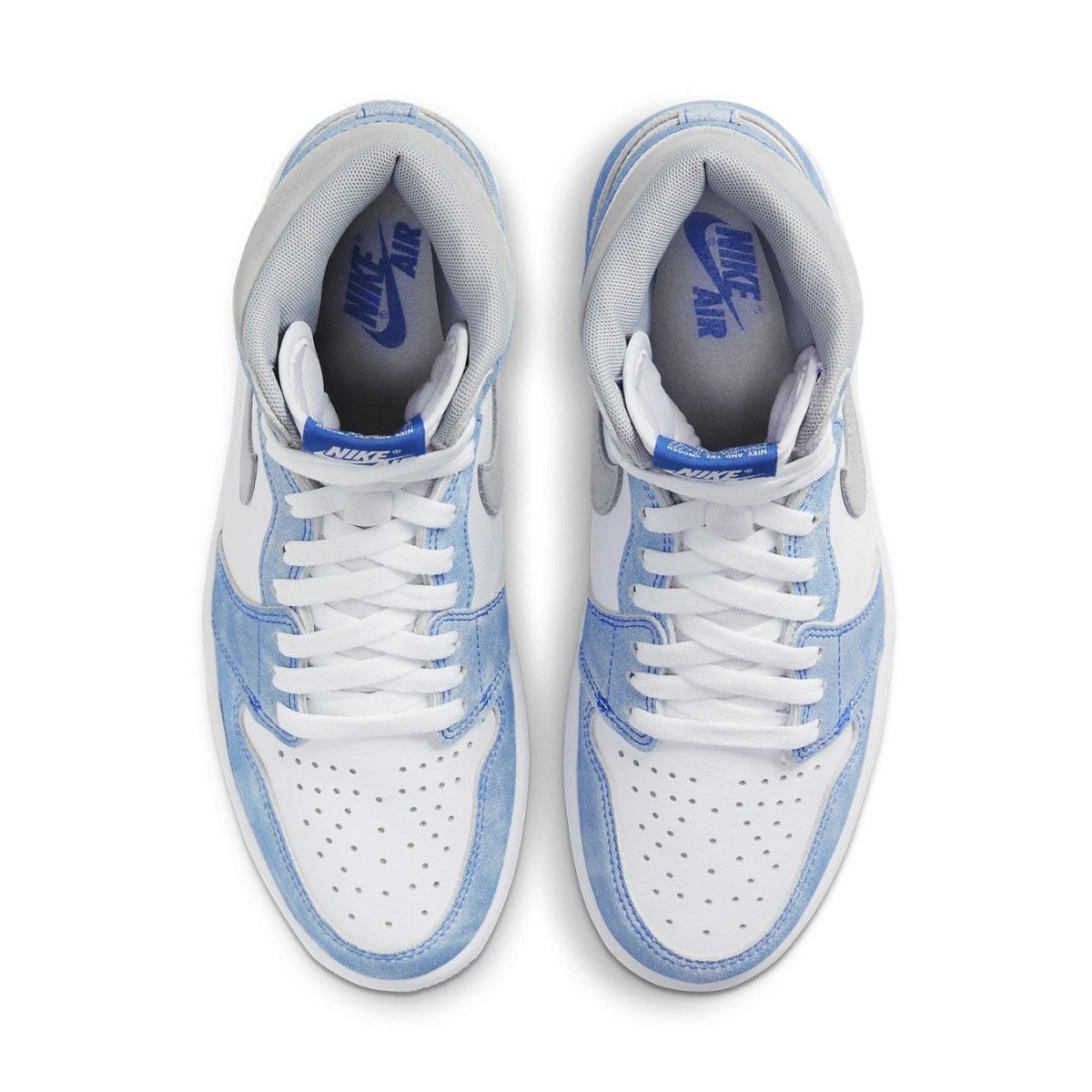Top view of Jordan 1 Retro High OG Hyper Royal sneakers featuring white leather and faded blue suede.