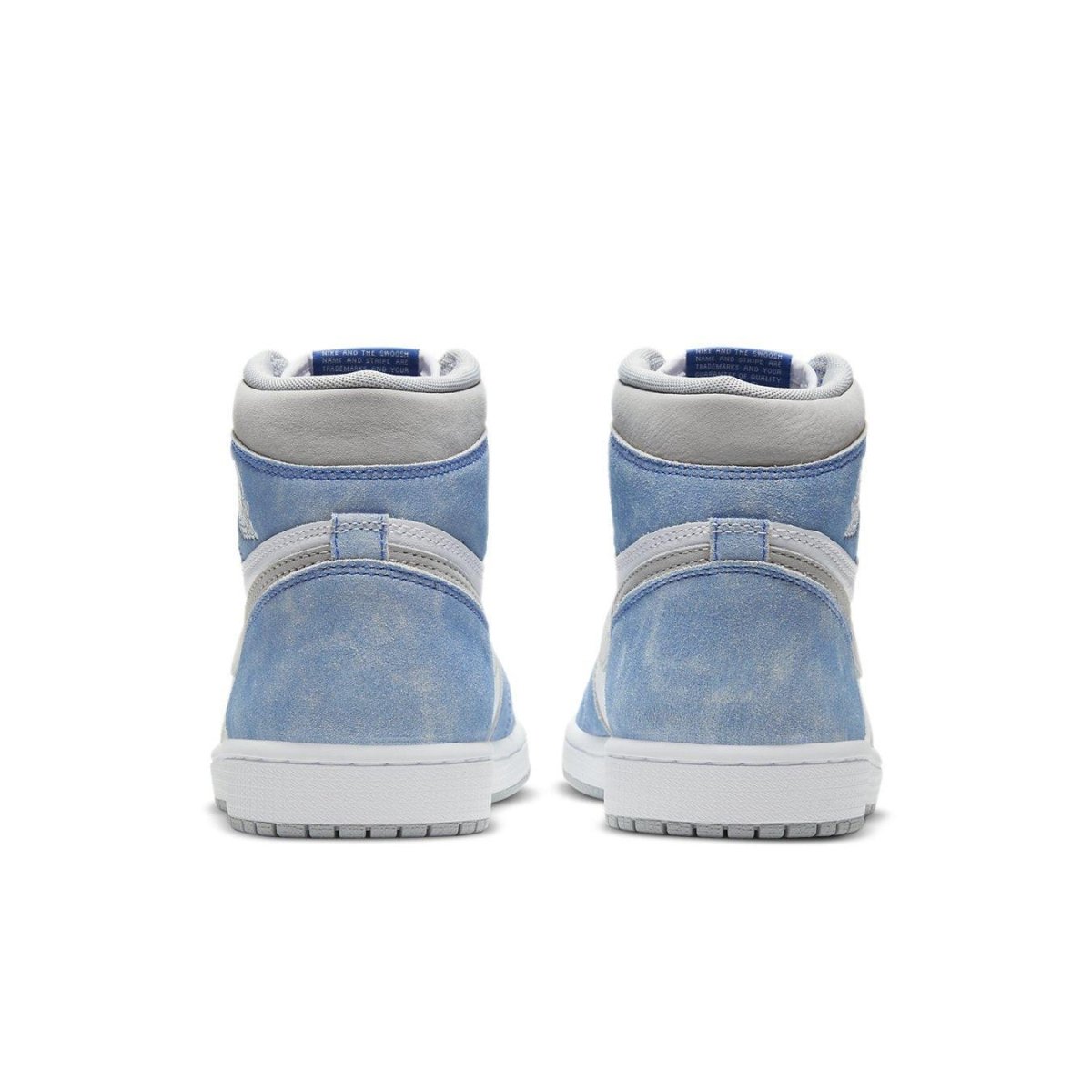 Retro high-top sneakers in faded blue suede with gray accents and classic Jordan design details.