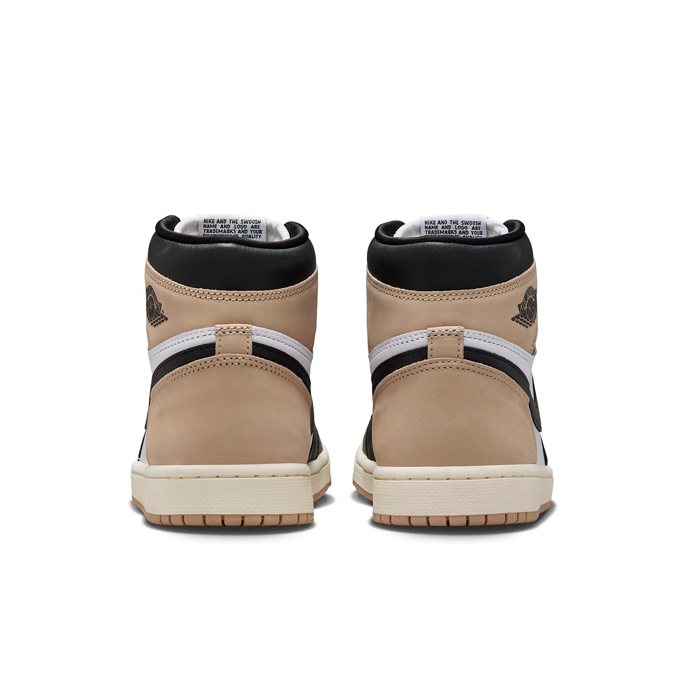 Back view of Women's Air Jordan 1 Retro High OG 'Latte' showcasing suede and leather details in beige and black.