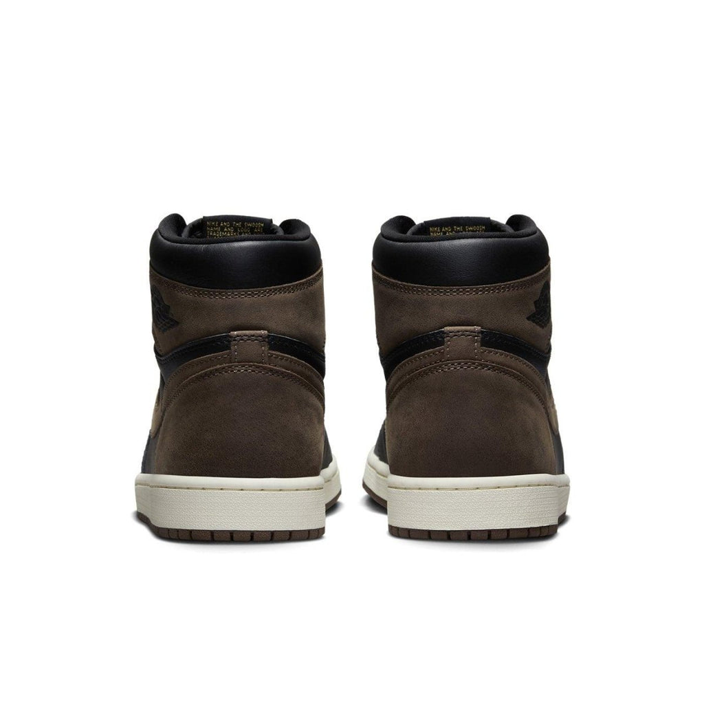 Back view of Air Jordan 1 Retro High OG Palomino featuring brown nubuck and black leather accents.