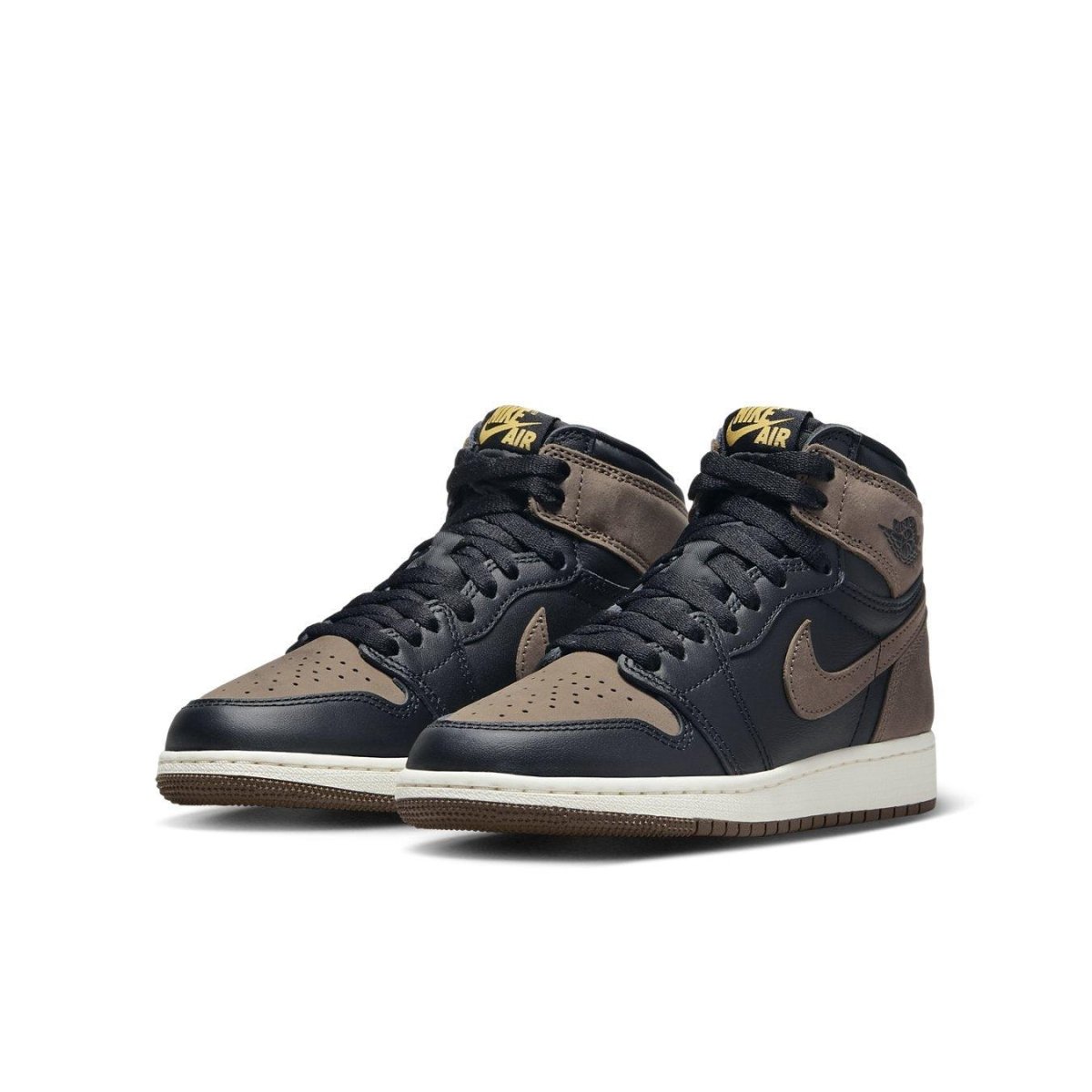 Jordan 1 Retro High OG Palomino GS in black and brown leather with yellow Nike Air logo on tongue.