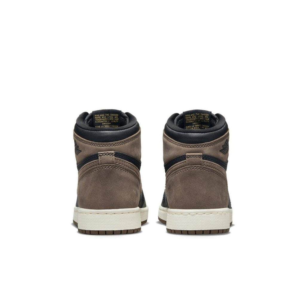 Rear view of Air Jordan 1 Retro High OG Palomino GS in brown suede and black detailing.