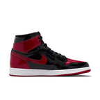 Air Jordan 1 Retro High OG Patent Bred sneakers with sleek black and red patent leather design.
