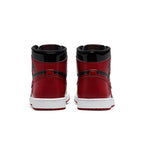 Rear view of Air Jordan 1 Retro High OG Patent Bred showcasing glossy red and black design.