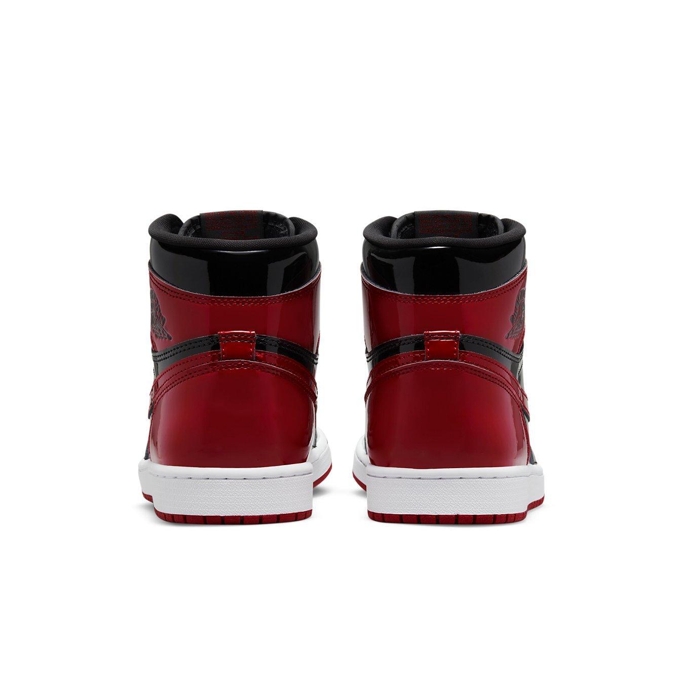 Rear view of Air Jordan 1 Retro High OG Patent Bred showcasing glossy red and black design.