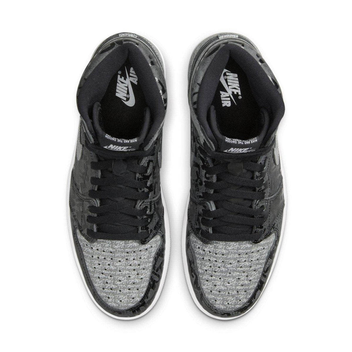 Top view of the Jordan 1 Retro High OG Rebellionaire sneakers featuring a premium black and silver design.