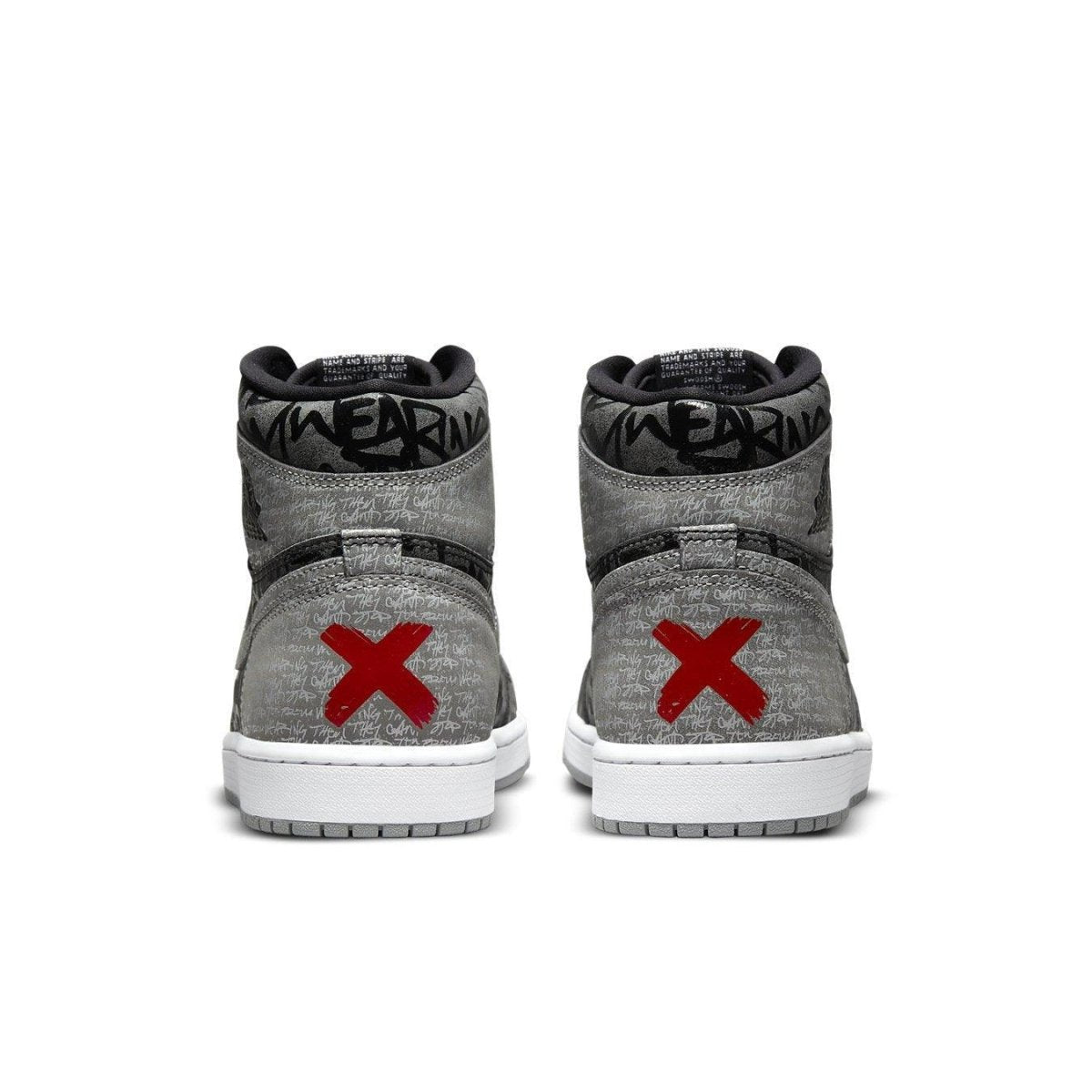 Jordan 1 Retro High OG Rebellionaire sneaker with gray upper and red accents on the heel.