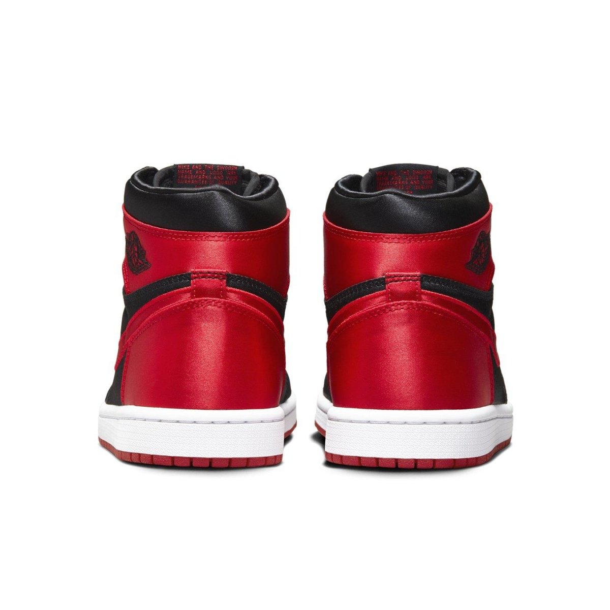 Back view of Women's Air Jordan 1 Retro High OG Satin Bred sneakers with sleek red satin finish.
