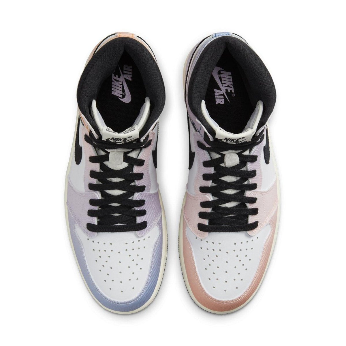 Top view of Air Jordan 1 Retro High OG Skyline sneakers, featuring pastel pink and lavender hues on a white base.