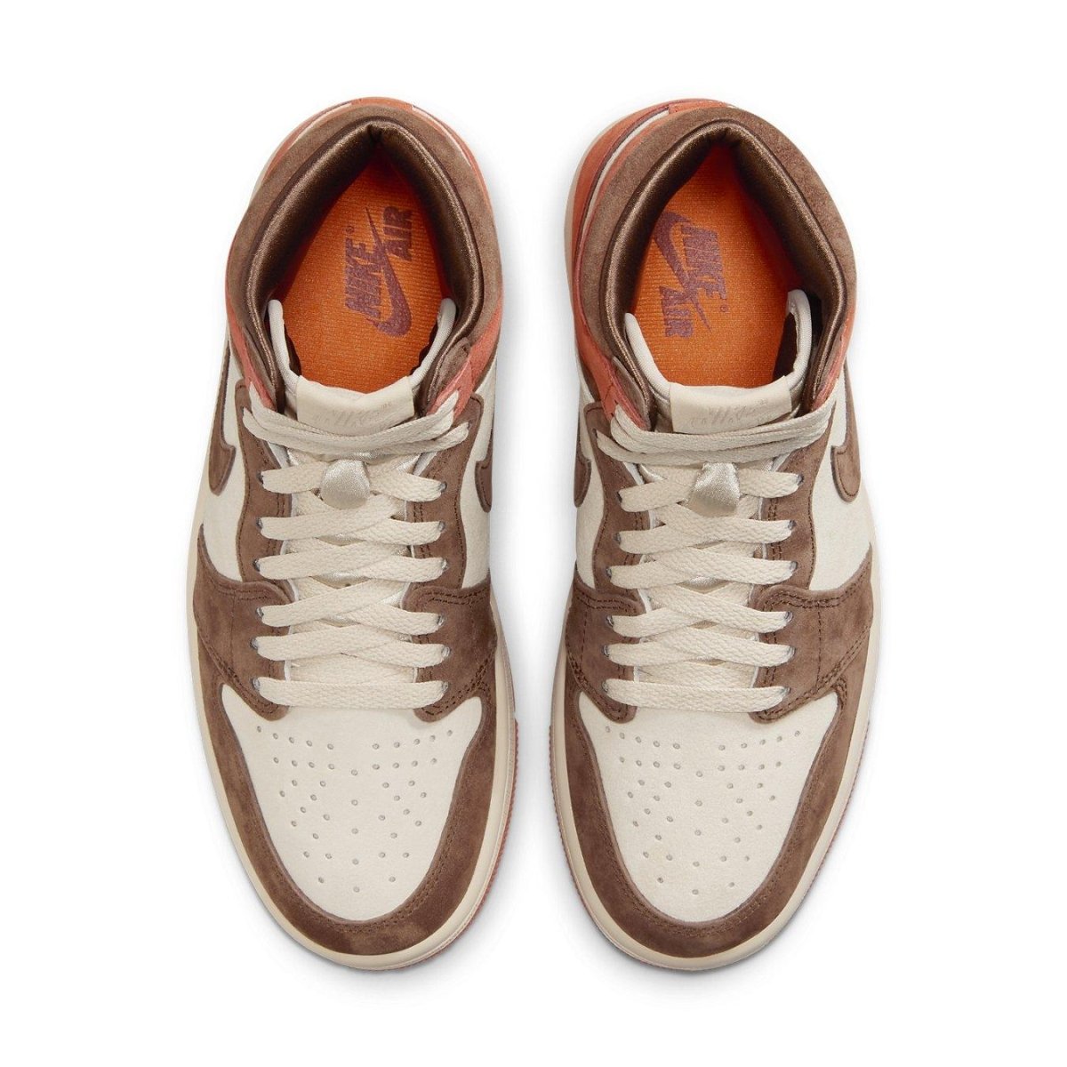 Top view of Women's Air Jordan 1 Retro High OG 'Dusted Clay' sneakers in tan and brown suede with orange accents.