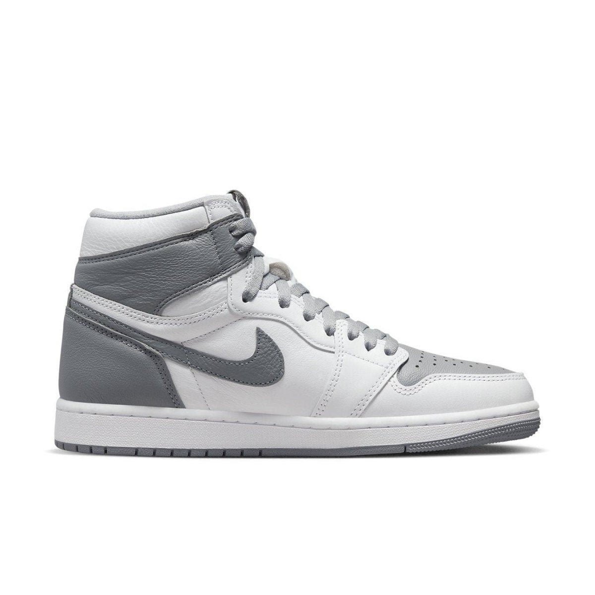 Jordan 1 Retro High OG Stealth sneaker featuring white leather and Stealth Grey suede accents.