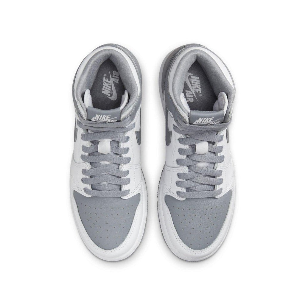 Air Jordan 1 Retro High OG Stealth (GS) sneakers featuring gray and white leather upper from the top view.