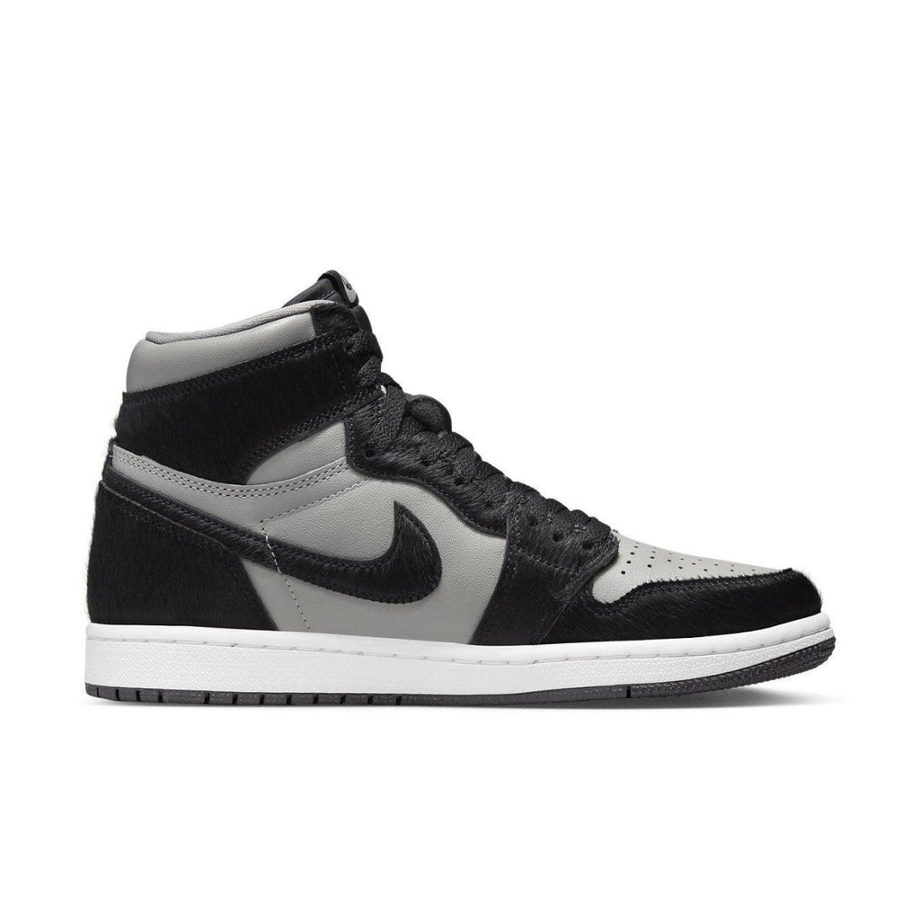 Air Jordan 1 Retro High OG Twist 2.0 in Medium Grey with pony hair accents and black sole.