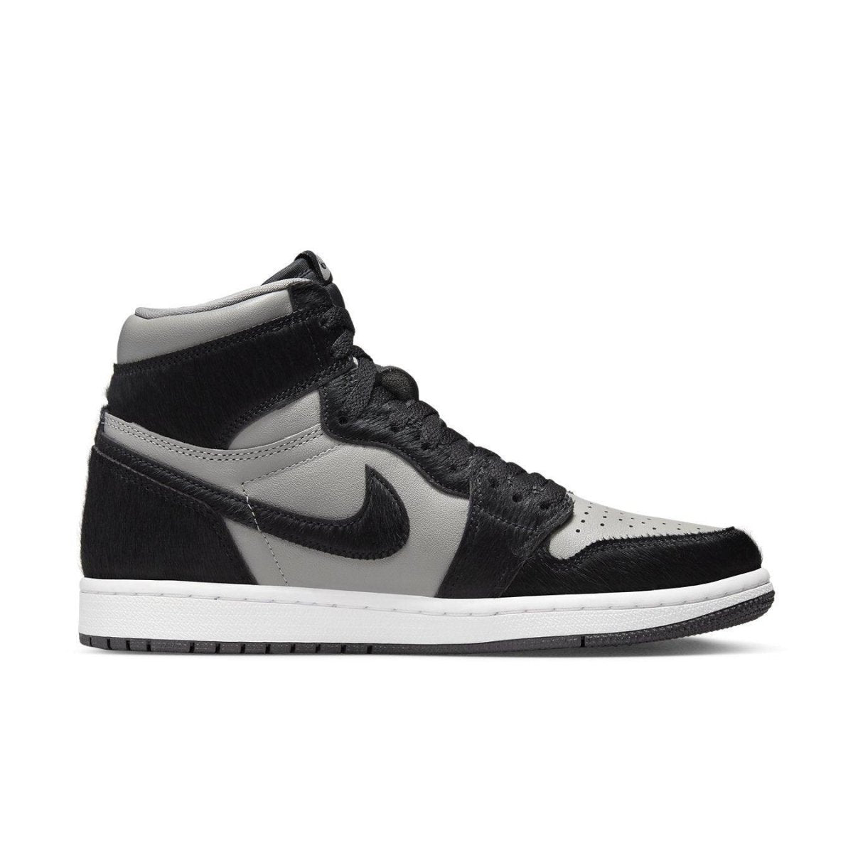 Air Jordan 1 Retro High OG Twist 2.0 in Medium Grey with pony hair accents and black sole.