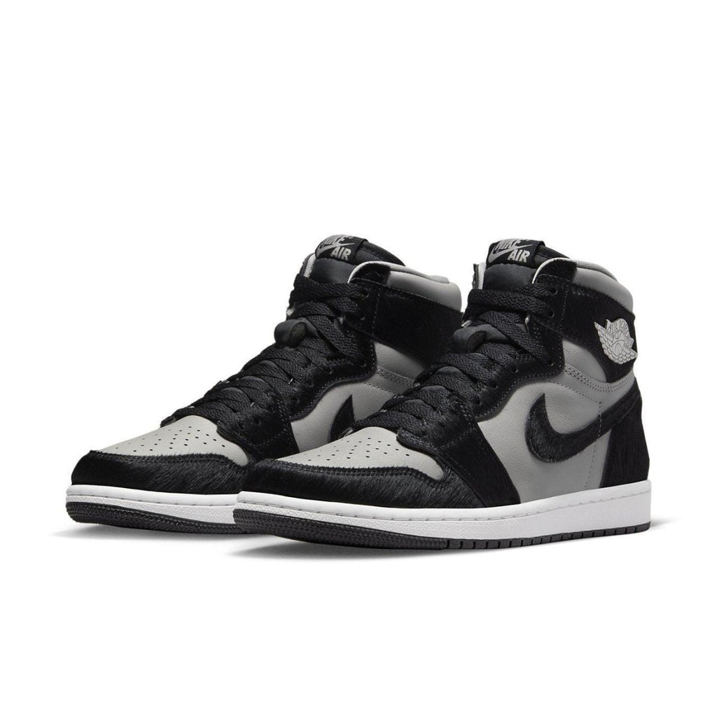 Air Jordan 1 Retro High OG Twist 2.0 in Medium Grey with pony hair overlays and black accents.