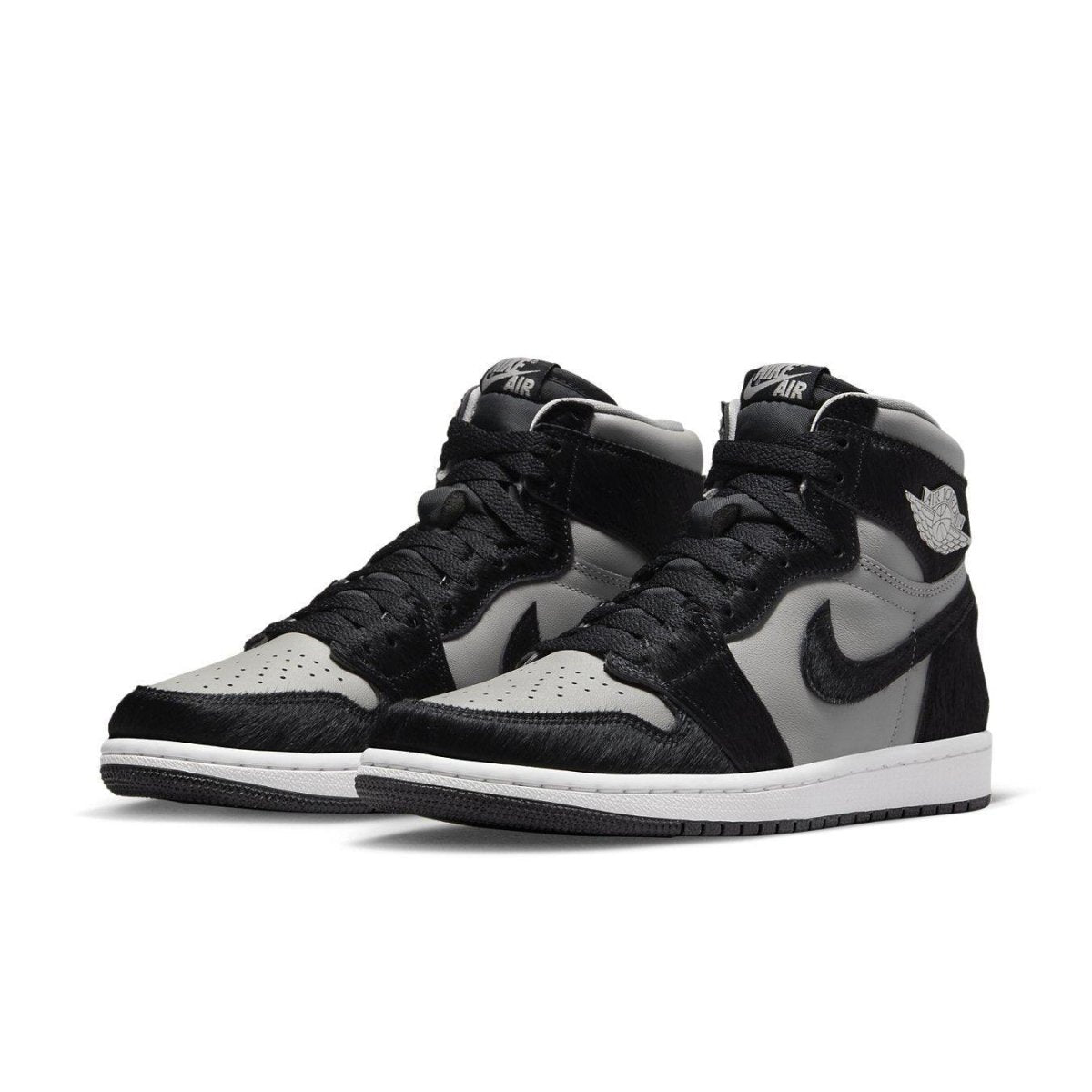 Air Jordan 1 Retro High OG Twist 2.0 in Medium Grey with pony hair overlays and black accents.