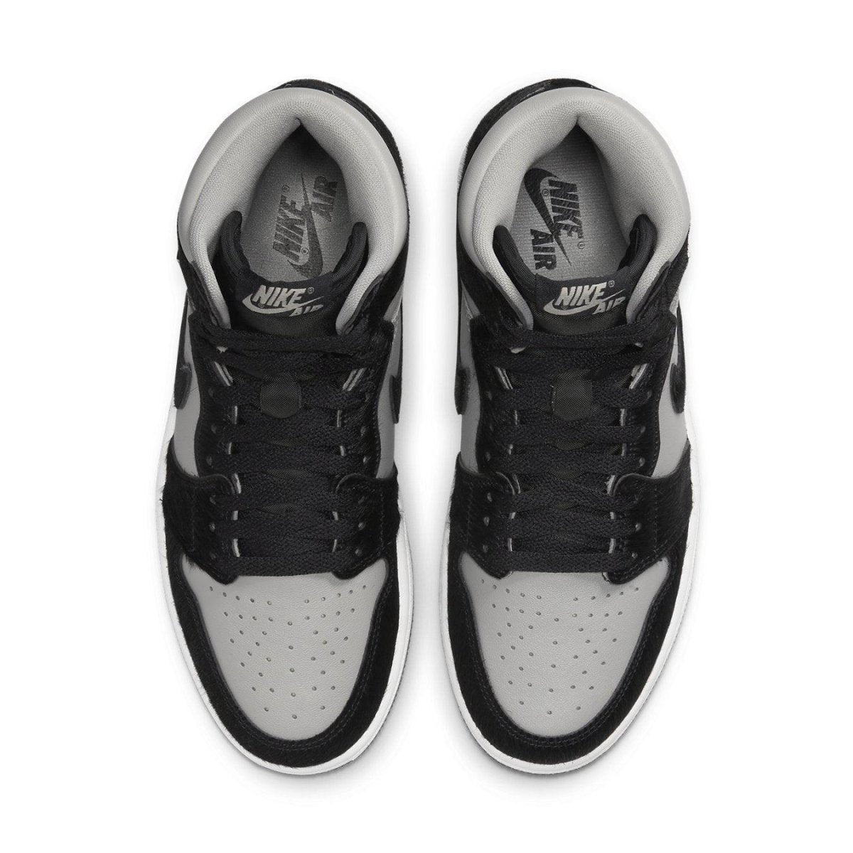 Air Jordan 1 Retro High OG Twist 2.0 Medium Grey top view showcasing grey and black colorway with Nike branding.