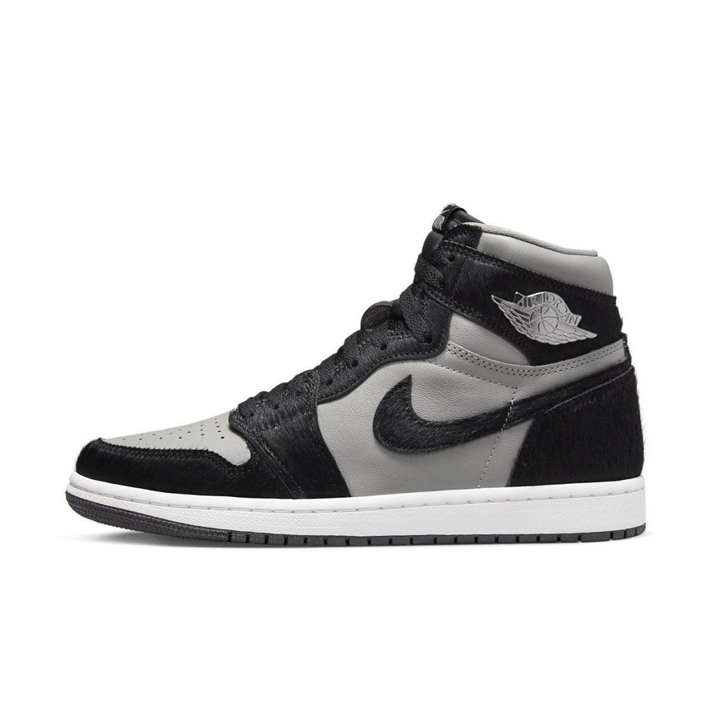 Air Jordan 1 Retro High OG Twist 2.0 in Medium Grey with black accents and Metallic Wings logo.