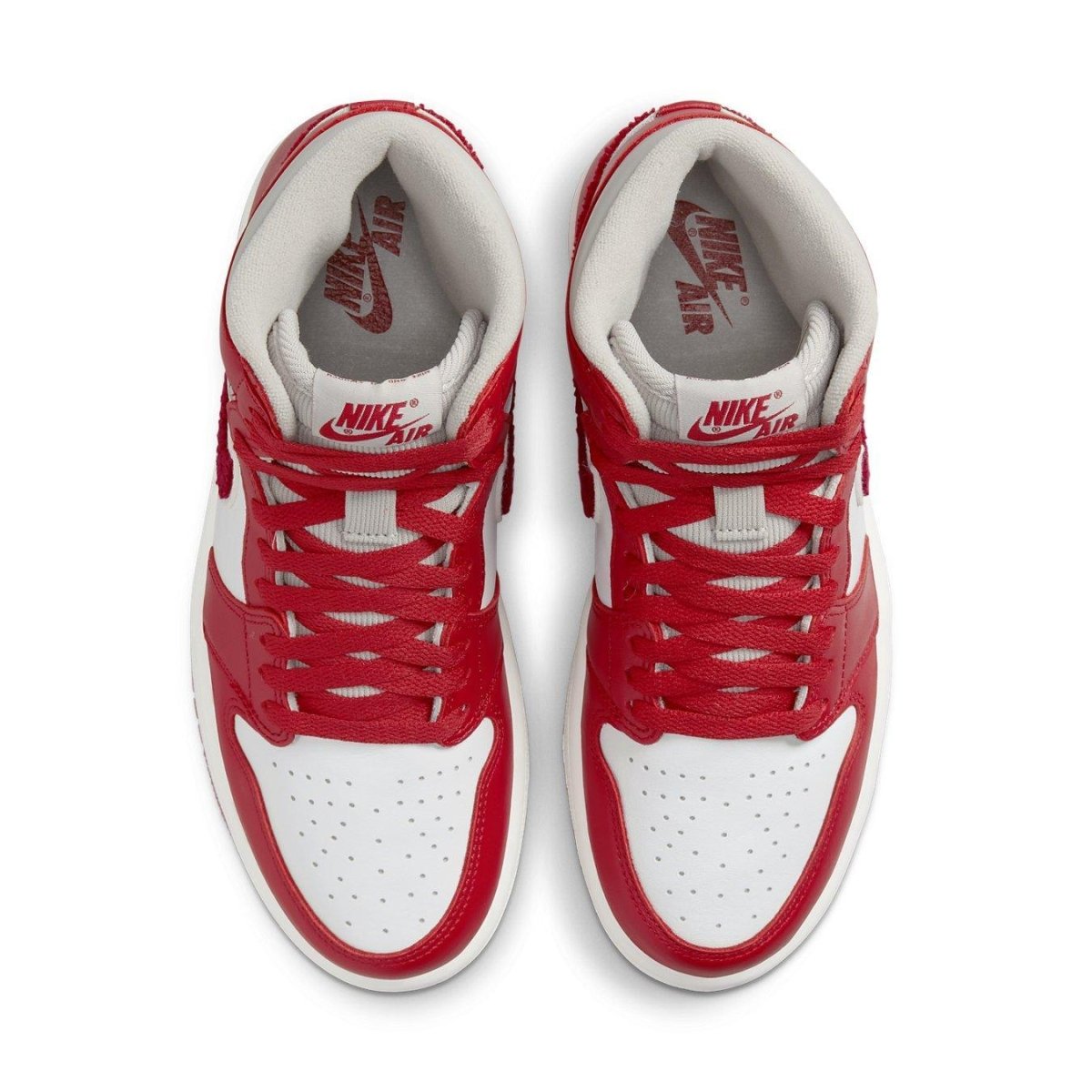 Jordan 1 Retro High OG Varsity Red women's sneakers featuring premium leather and varsity-inspired design.