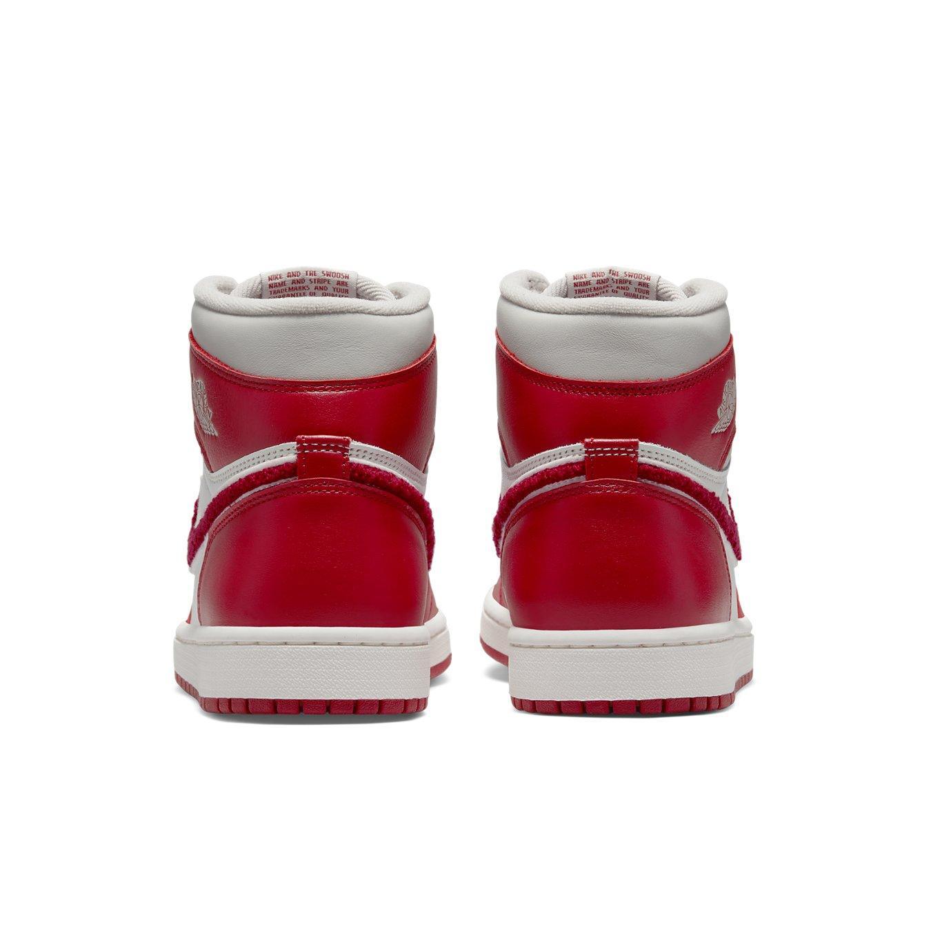 Back view of Jordan 1 Retro High OG Varsity Red women's sneakers showcasing premium leather and varsity design.