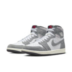 Jordan 1 Retro High OG Washed Black sneakers featuring white leather and gray suede details.