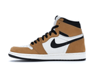 Air Jordan 1 Retro High OG Rookie of the Year with white leather and gold accents, showcasing a sleek side view.