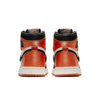 View of the back of the Jordan 1 Retro High Satin Shattered Backboard (W) showcasing its iconic orange and black design.