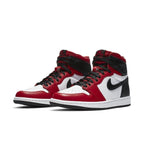 Jordan 1 Retro High Satin Snake Chicago (W) sneakers in red, white, and black colorway, showcasing classic design and style.