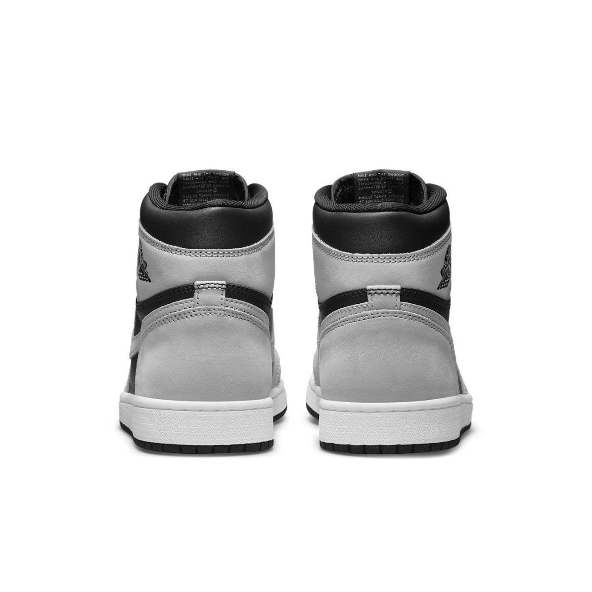Rear view of the Air Jordan 1 Retro High Shadow 2.0 showcasing sleek black and grey colorway with signature branding.