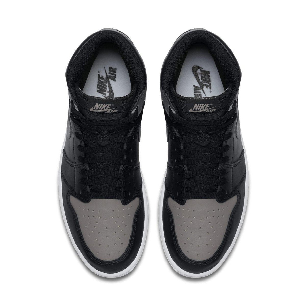 Nike Air Jordan 1 Retro High Shadow 2018 in black and medium grey, featuring iconic swoosh and perforated toe box.
