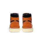 Back view of Jordan 1 Retro High Shattered Backboard 3.0 sneakers in orange and black colorway.