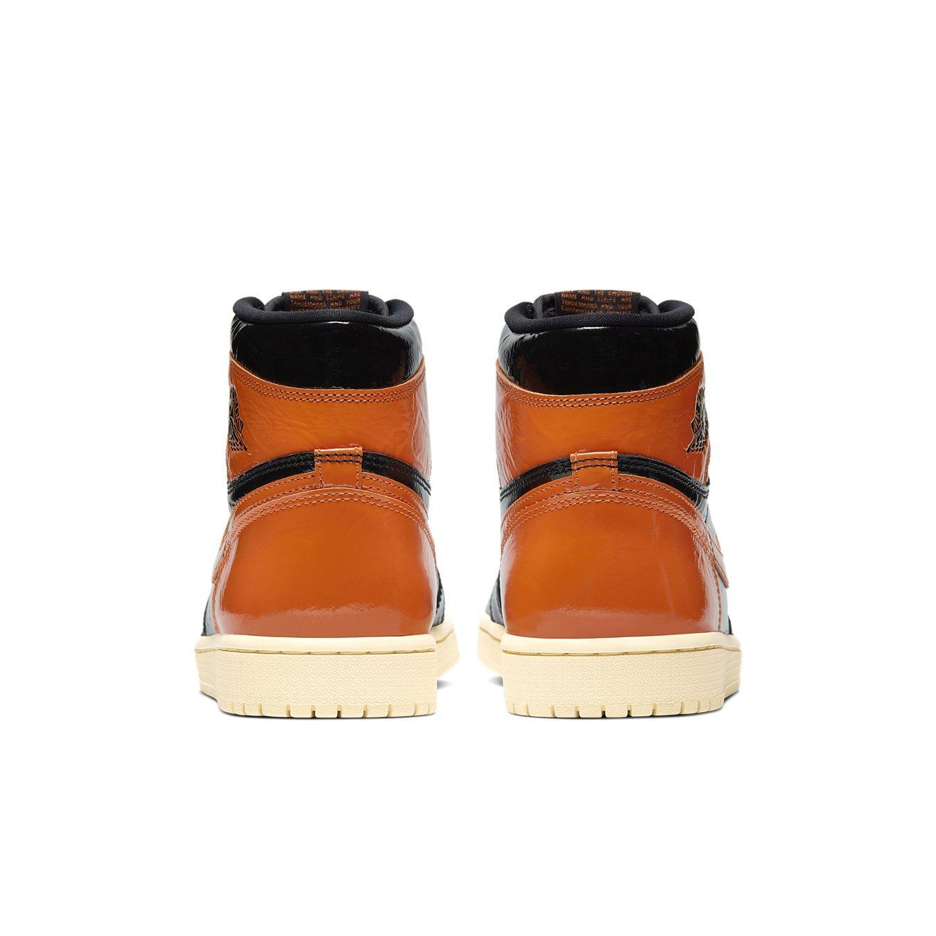 Back view of Jordan 1 Retro High Shattered Backboard 3.0 sneakers in orange and black colorway.